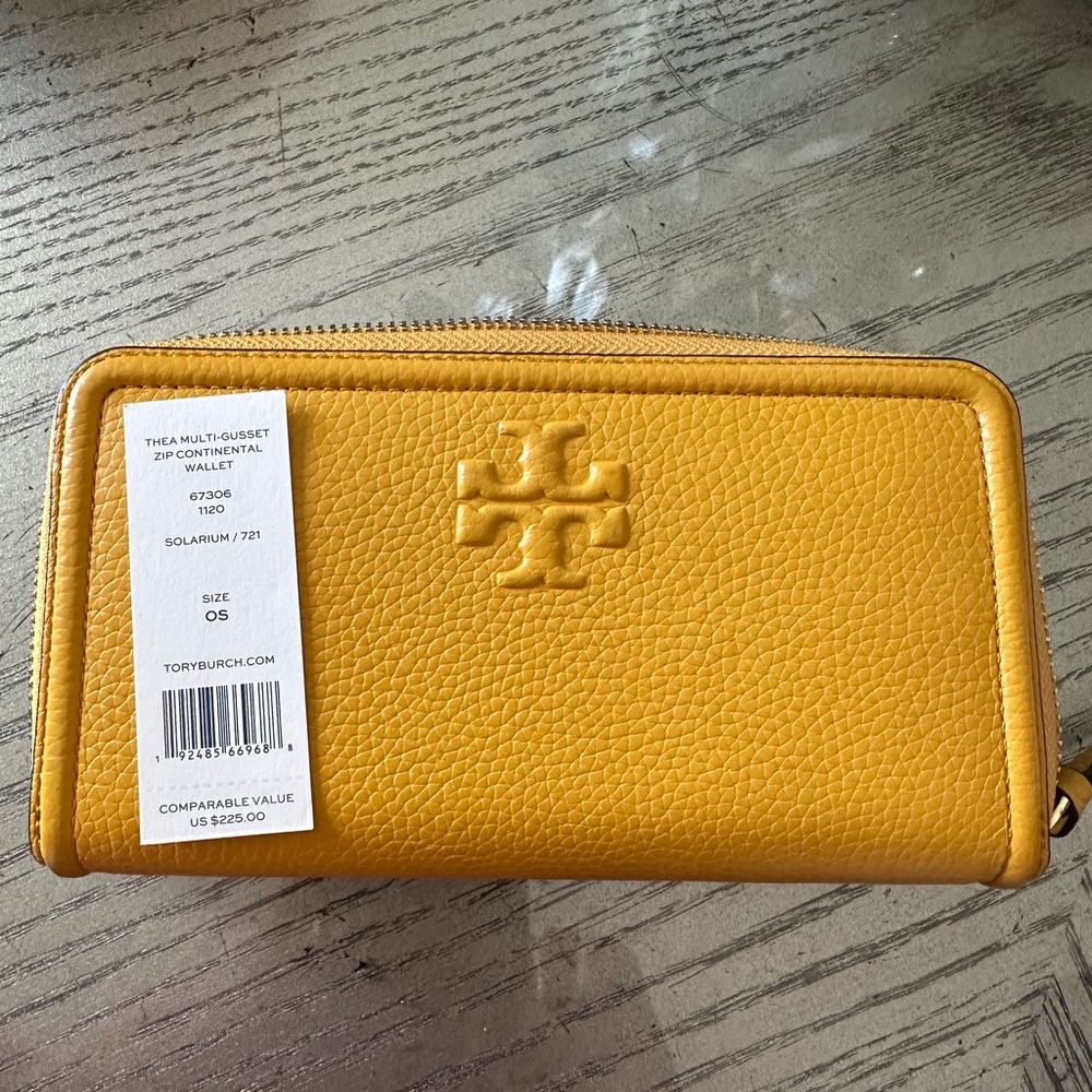 Tori Burch Honey Mustard Wallet Large able to hold a lot of items inside